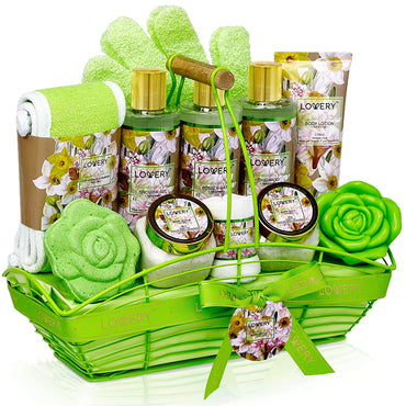 Home Spa Gift Baskets for Women, Bath and Body Gift Basket, Magnolia & Jasmine Home Spa Set, Fragrant Lotions, Bath Bomb, Towel, Shower Gloves, Green Wired Bread Basket & More, 13Pcs